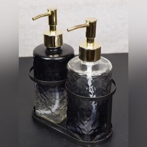 Black and gold soap dispensers
